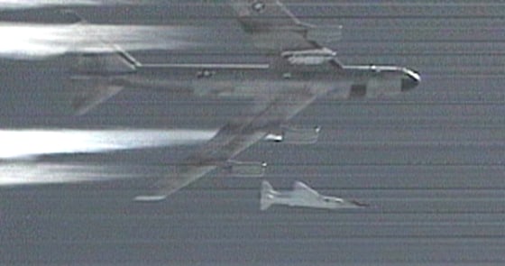 A video still taken Saturday shows NASA's X-43A Hypersonic Experimental Vehicle being released from the wing of a B-52 aircraft somewhere over the Pacific Ocean.