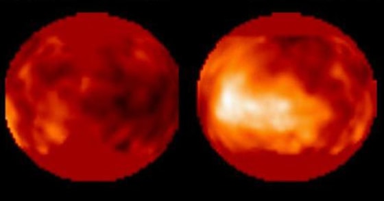 Light and dark surface features show up in infrared images of Titan, captured by the Hubble Space Telescope. Do those features represent continents and oceans of liquid ethane and methane? Scientists say it's too early to tell.