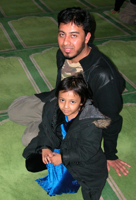 Hasan Faruq and his daughter, Zainab, are seen following afternoon prayers at the East London Mosque, in the British capital.