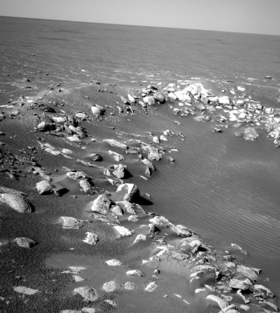Jumbled blocks of rock outline the rim of Fram Crater, an intermediate stop along the Opportunity rover's route to the much larger Endurance Crater.