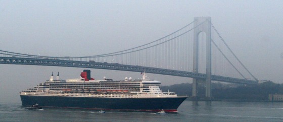 The Queen Mary 2 sails under the Verrazano Narrows bridge at low tide, six days after leaving England.
