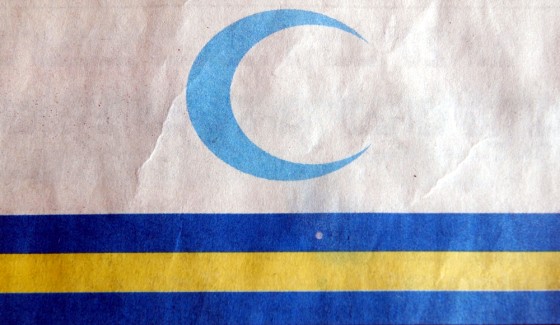 The new Iraqi flag flag includes two blue horizontal stripes signifying the two rivers Tigris and Euphrates.