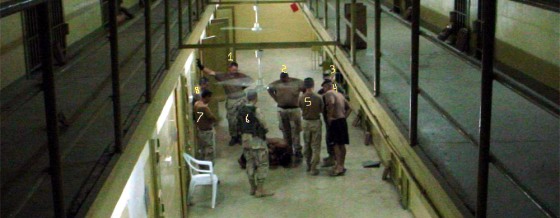 Spc. Charles A. Graner Jr.,&nbsp;leaning against the wall and labeled as No. 1, identified four other soldiers in this photograph (Nos. 4, 5, 7 and 8) as military intelligence officers. No. 2 is&nbsp;a civilian translator.