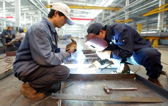 CHINESE WORKERS AT BEHLEN PLANT