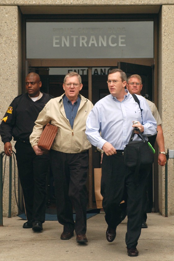 Former U.S. Rep. Bill Janklow, center left, walks with his son Russ Janklow as he leaves the Minnehaha County Jail on Monday.