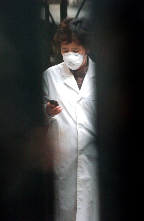 QUARANTINED WORKER MAKES PHONE CALL IN BEIJING
