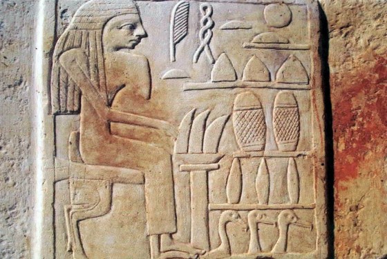 A photo released on June 13 shows a relief featuring a woman seated in front of an offering table that was found after Australian archaeologists unearthed a necropolis dated to the first and fourth dynasties.