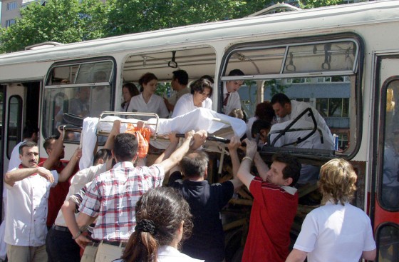 Medics carry away&nbsp;injured victims Thursday after a bomb exploded aboard a city bus in&nbsp;Istanbul. 