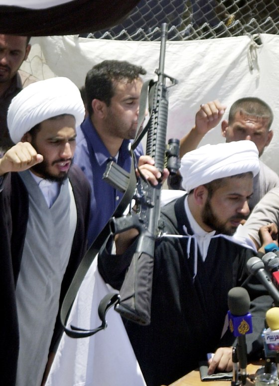 Iman Awas al-Khafaji, spokesman for Shiite radical leader Muqtada al-Sadr in Sadr City neighborhood, speaks at the al-Haqmi Mosque in Baghdad Friday.