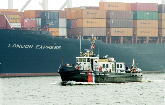 COAST GUARD BOAT PATROLS NEAR CARGO SHIP