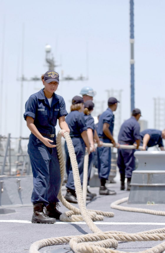 Sailors prepare for the arrival of a ship at the U.S. Navy port in Manama, Bahrain, home to the 5th Fleet.