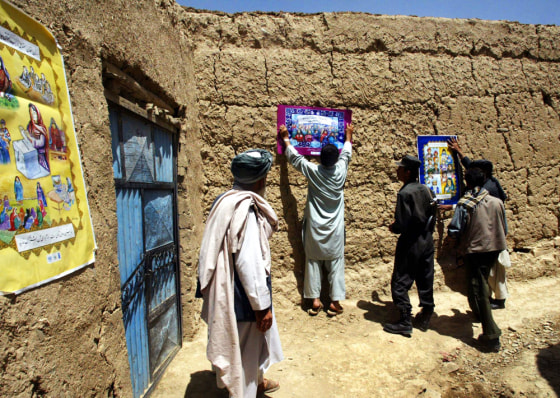 ELECTION OFFICIAL PUT UP POSTERS