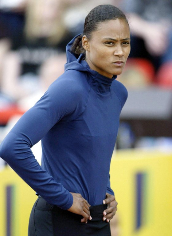 As five-time Olympic gold medalist Marion Jones prepared for Friday's early rounds of the 100 meters at the eight-day U.S. Olympic track and field trials, she is dogged by far weightier questions than how many medals she will win in this year's Games.