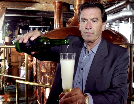 Brew master Kenth Persson pours a glass of his genetically modified beer at his brewery in Osterlen, Sweden.