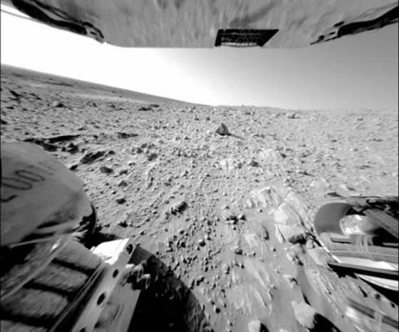 A large, continuous rock outcrop at the base of the "Columbia Hills" is seen in this image taken by Spirit's rear hazard-avoidance camera.