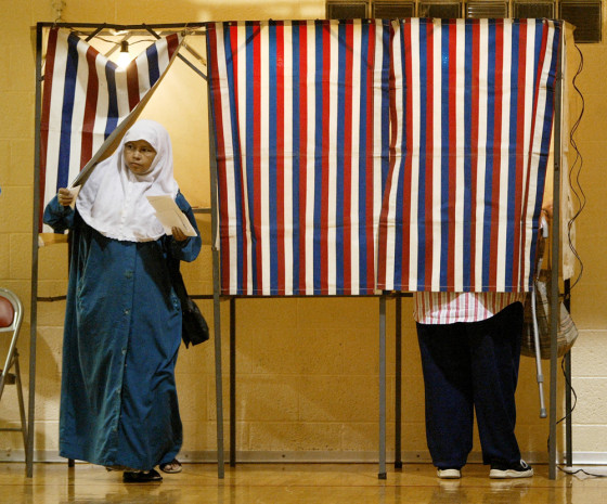 A Hamtramck, Mich. resident leaves a voting booth at the St. Ladislaus gymnasium on Tuesday after casting her ballot on the question of whether mosques should be allowed to broadcast calls to prayer over loudspeakers.