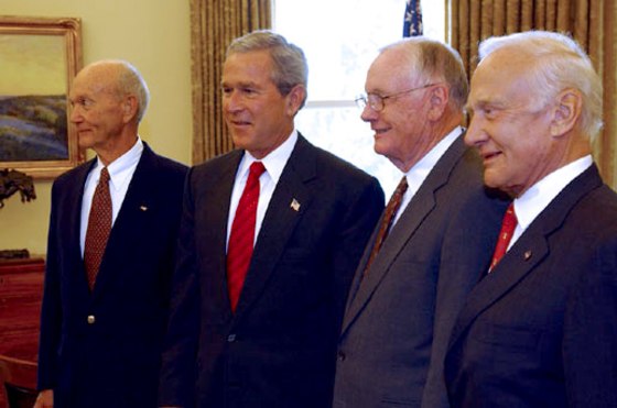 President Bush meets with Apollo 11 crew members Michael Collins, Neil Armstrong and Buzz Aldrin on Tuesday in the Oval Office, in recognition of the 35th anniversary of the first manned moon landing. Bush's space vision is aimed at sending Americans back to the moon.