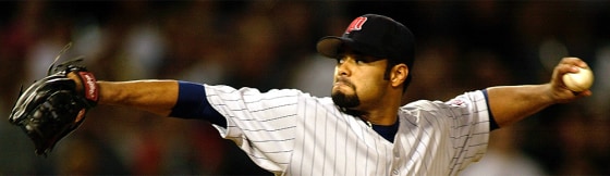 Twins starting pitcher Santana throws to the plate in the sixth