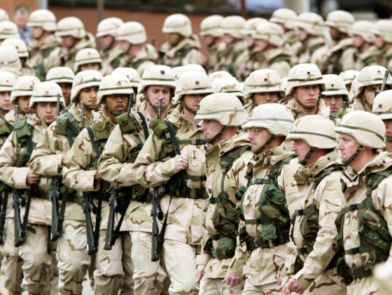 Soldiers of the United States Army's V Corps, based in Heidelberg, Germany, march to a welcome back ceremony on March 19.