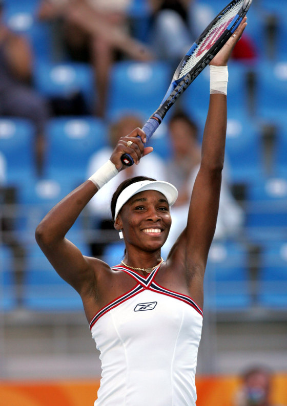 Williams of the US celebrates her victory over Slovenia's Matevzic in Olympic tennis in Athens