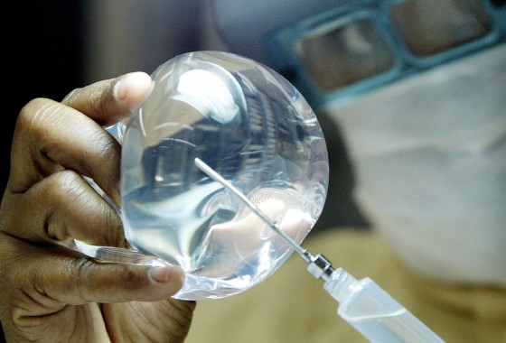 LAB WORKER CHECKS SILICONE IMPLANT IN RIO DE JANEIRO