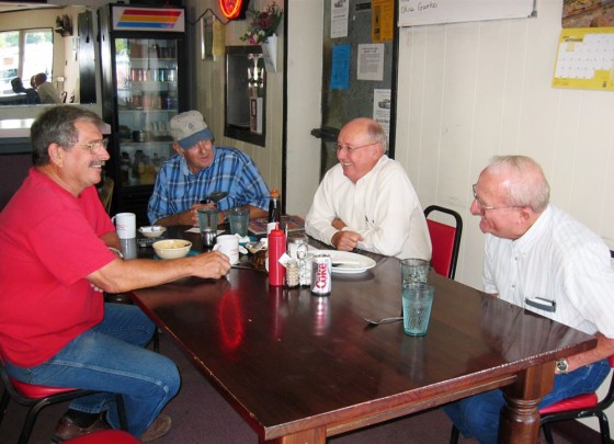 A group of regular customers at the Santa Fe Cafe having breakfast as they did on the morning of 9/11. From left to right: Don Boecker, David Blakey, Sonny Schulte, and Jimmy Becker.