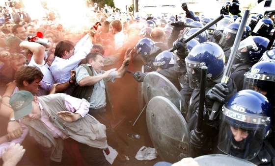 Pro-hunting demonstrators clash with police outside the Houses of Parliament in London