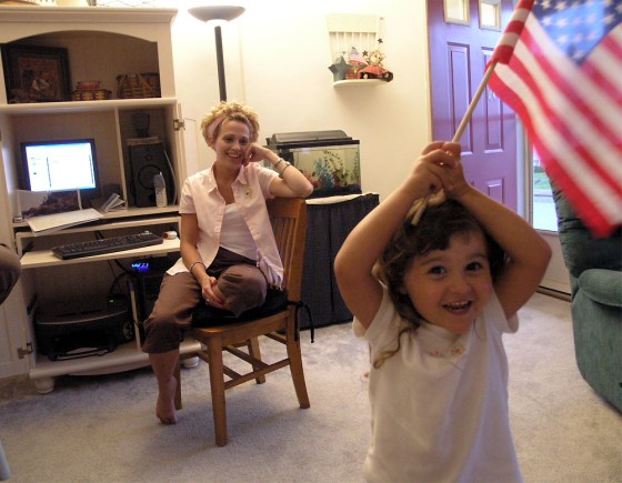 Karen Finucan and daughter Grace at home in Berwick, Pa. Karen's husband Guy is in Iraq with the Pennsylvania Army National Guard.