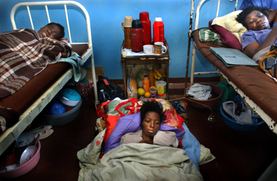 Among the crises facing the next president is the HIV/AIDS pandemic, so serious it is also considered a security issue. These women suffering from from the illness crowd into a room at Queen Elizabeth Hospital Blantyre, Malawi, in July.