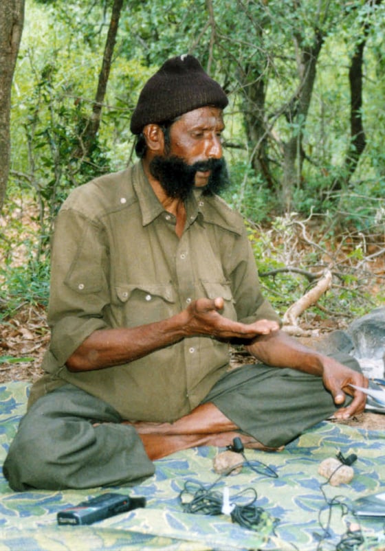 INDIA'S MOST WANTED BANDIT MEETS GOVERNMENT EMISSARY IN THE FOREST