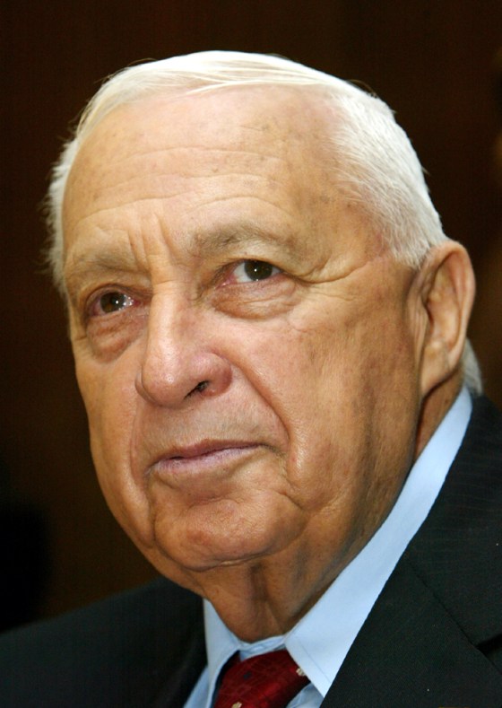 Israeli Prime Minister Ariel Sharon attends a meeting with Israeli President Moshe Kazav in Jerusalem