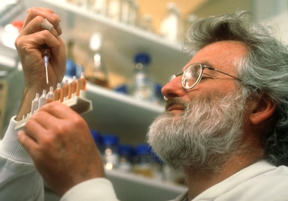 JOHN SULSTON OF THE SANGER CENTRE WORKS ON HUMAN GENOME PROJECT