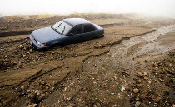 First Storm Brings Floods to California Wildfire Areas