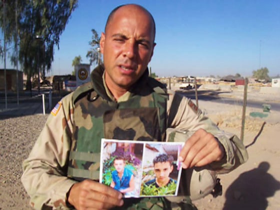 Carlos Lazo tapes a message from Iraq to Congress urging lawmakers to allow him visit his teenage sons in Cuba