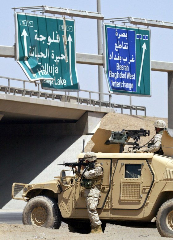 US MARINE SEARCHES FOR INSURGENTS DURING GUNFIGHT IN FALLUJA