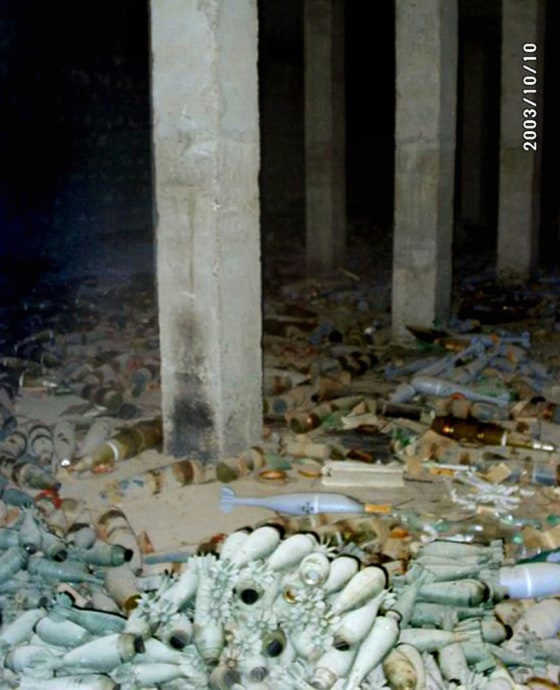 Mortar rounds and other munitions litter the ground at the Ukhaider Ammunition and Missile Storage area near Karbala, Iraq, in an Oct. 10 photo taken by civilian aid worker Jerry Kudaiha. 