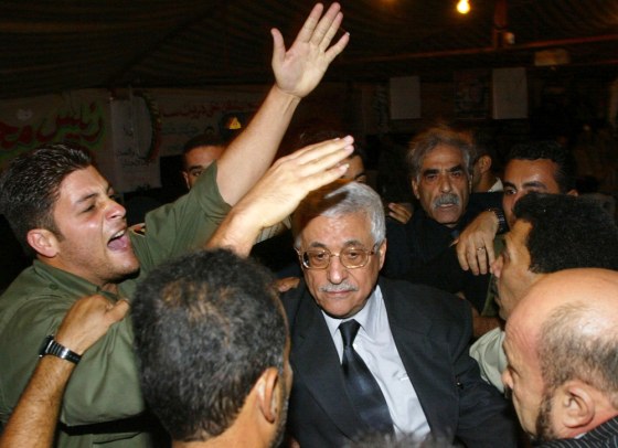 A Palestinian security guard shouts as h