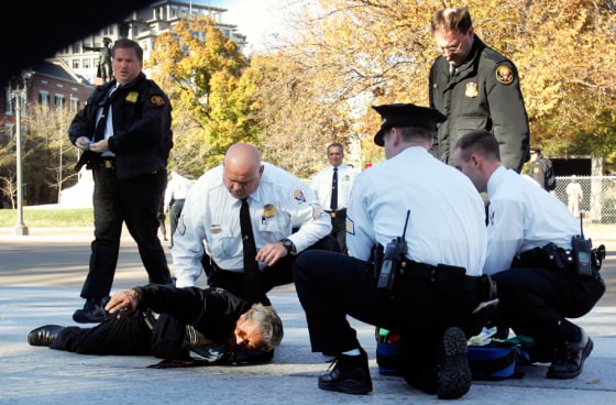 Police subdue man who set his possessions on fire outside the White House