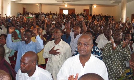 Members of the Young Patriots, along with some older supporters, rally in Abidjan, Ivory Coast, on Tuesday.