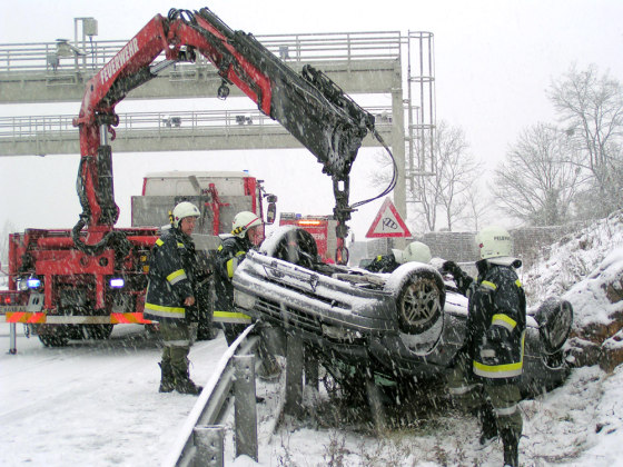 FIREBRIGADE OVERTURNED CAR