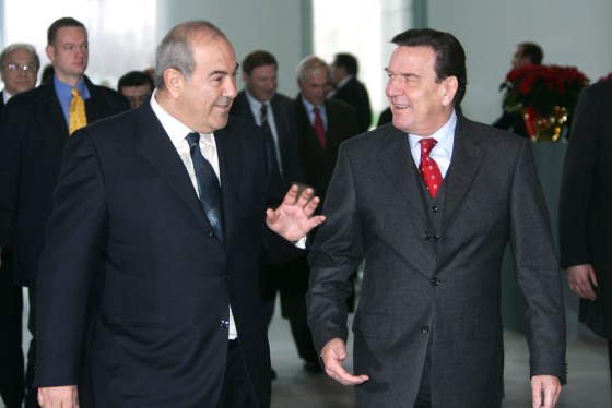 German Chancellor Gerhard Schroeder, right, welcomes Iraqi interim Prime Minister Ayad Allawi at the Chancellery in Berlin on Friday.