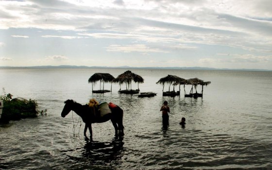 Children of Ometepe Island play in Nicaragua Lake