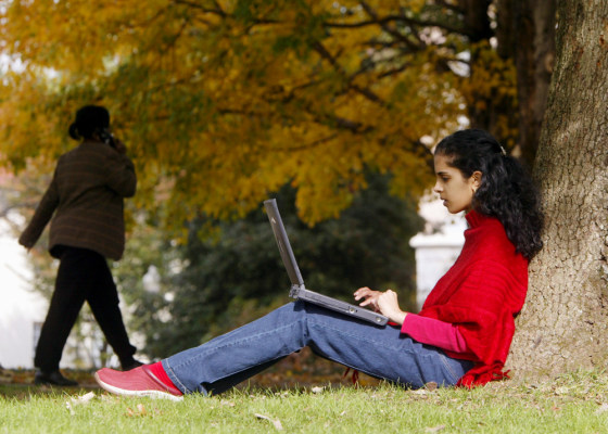 Emory University freshman Suhas Sridharan checks e-mail on her laptop computer via a wireless connection on the Atlanta campus.