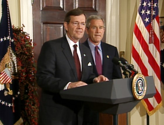 EPA chief Mike Leavitt speaks at the White House Monday as President Bush looks on.