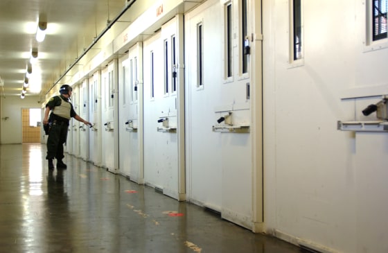 Guard checks doors at San Quentin prison