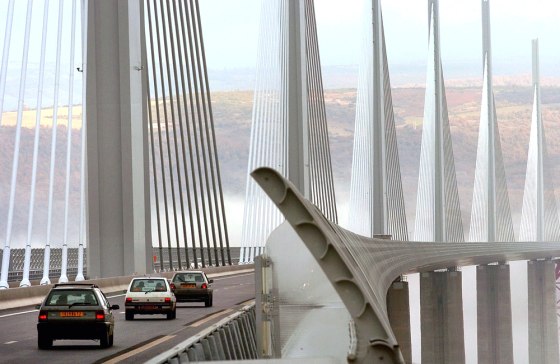 Traffic begins to cross the newly opened Millau Bridge in southern France on Thursday. 