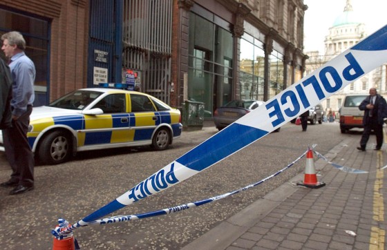 A police line tapes off the side of the