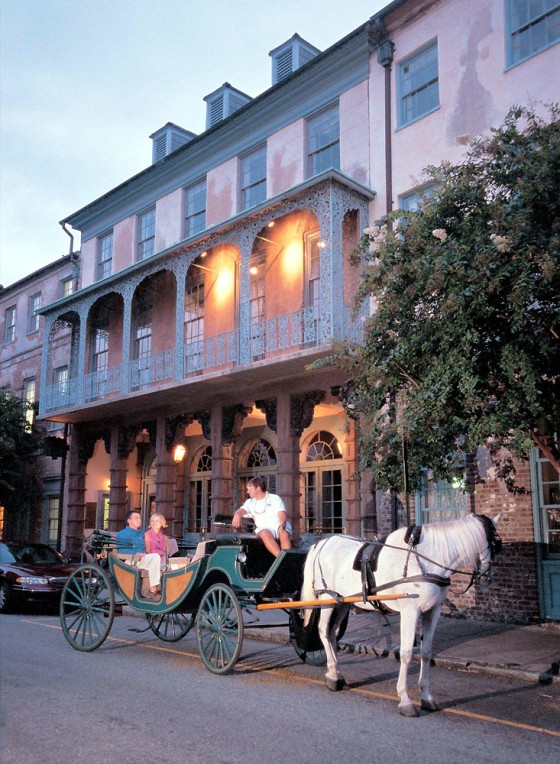 A couple takes a carriage ride in front of Historic Dock Street Theater, in Charleston, S.C., which consistently tops the list of the nation's best-mannered cities.