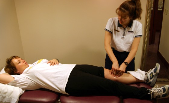 Each physical therapy session begins with therapist Bonnie Mangino massaging my left patellar tendon.