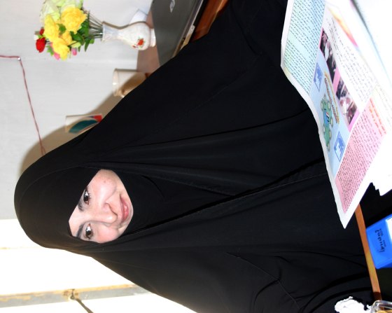 As a religiously dressed woman in authority, Bushra Zamili, 35, head of the Najaf elections commission, is a symbol of change in Iraq.
